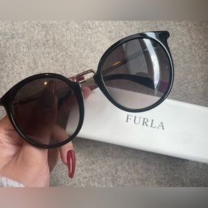 Furla sunglasses, black frame with purple tips towards ear piece